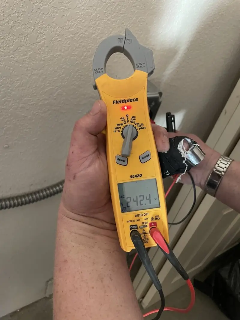 Voltage testing with clamp meter during Generator Installation in Ruskin